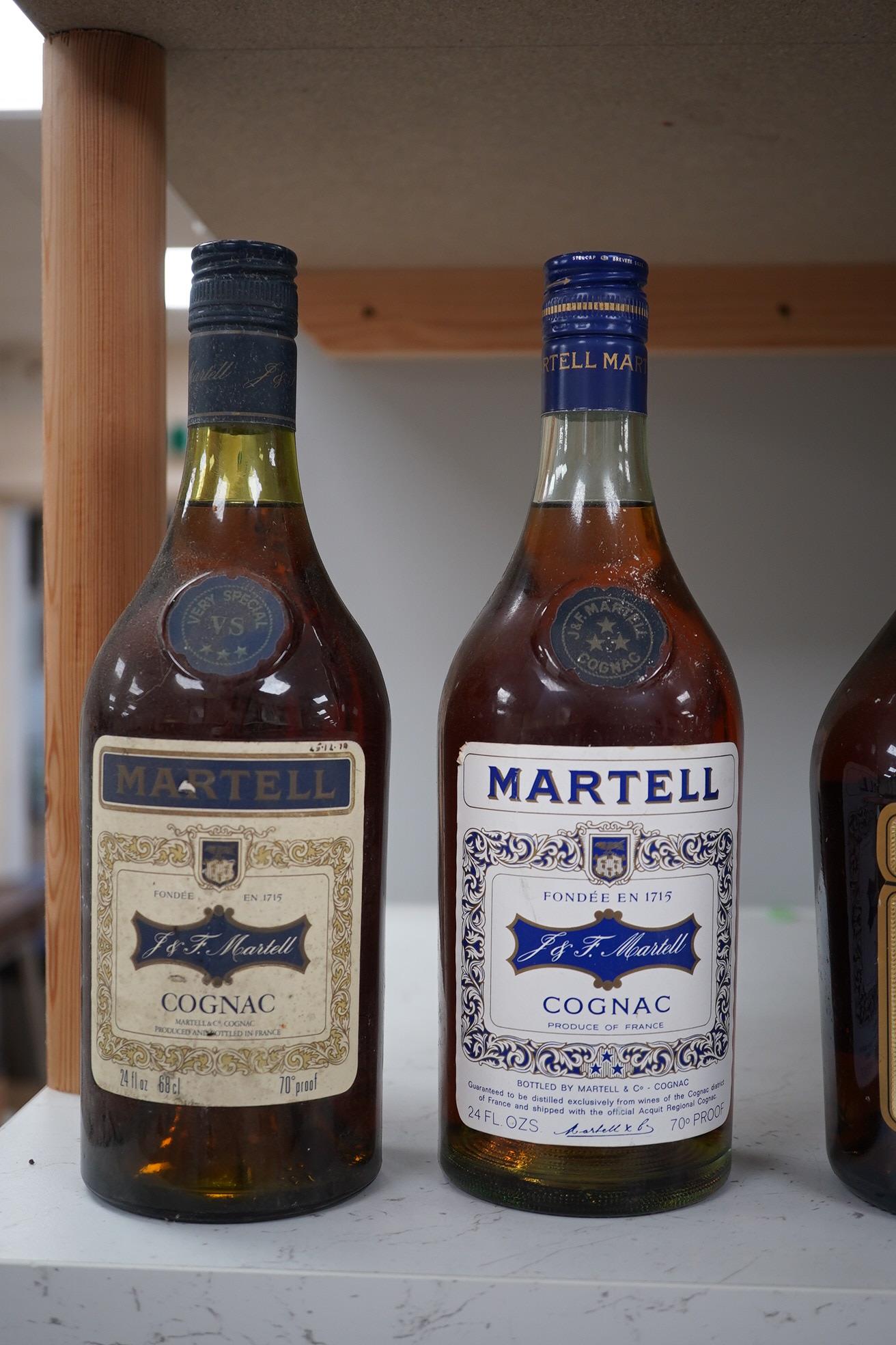 Seven various bottles of cognac to include a boxed bottle of Remy Martin, Courvoisier. Condition - unknown how stored